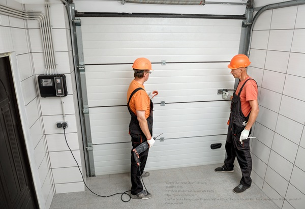 Workers Are Installing Lift Gates In The Garage.